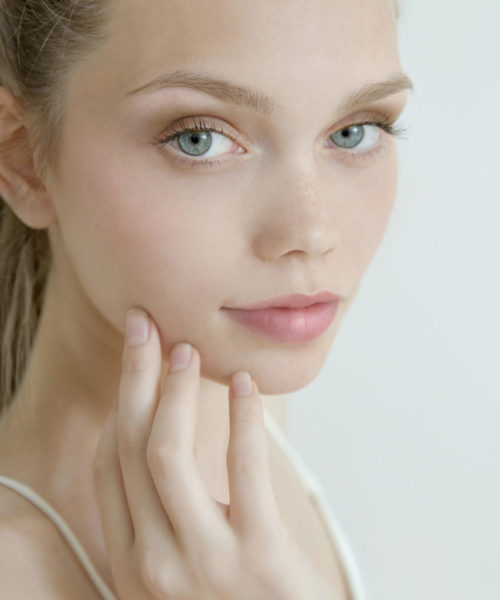 Beautiful young woman with clean fresh skin